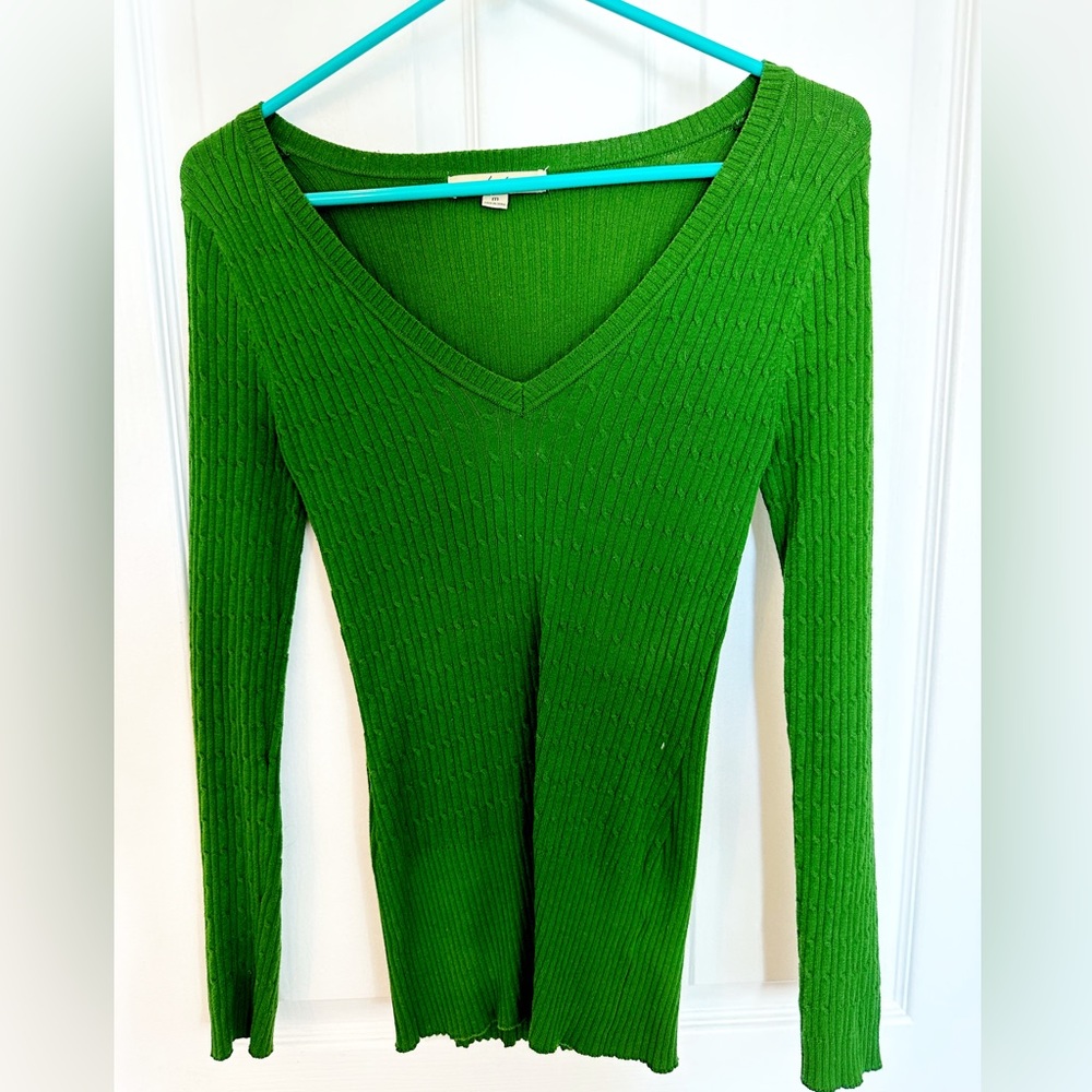 Emerald green long sleeve sweater with braided detail